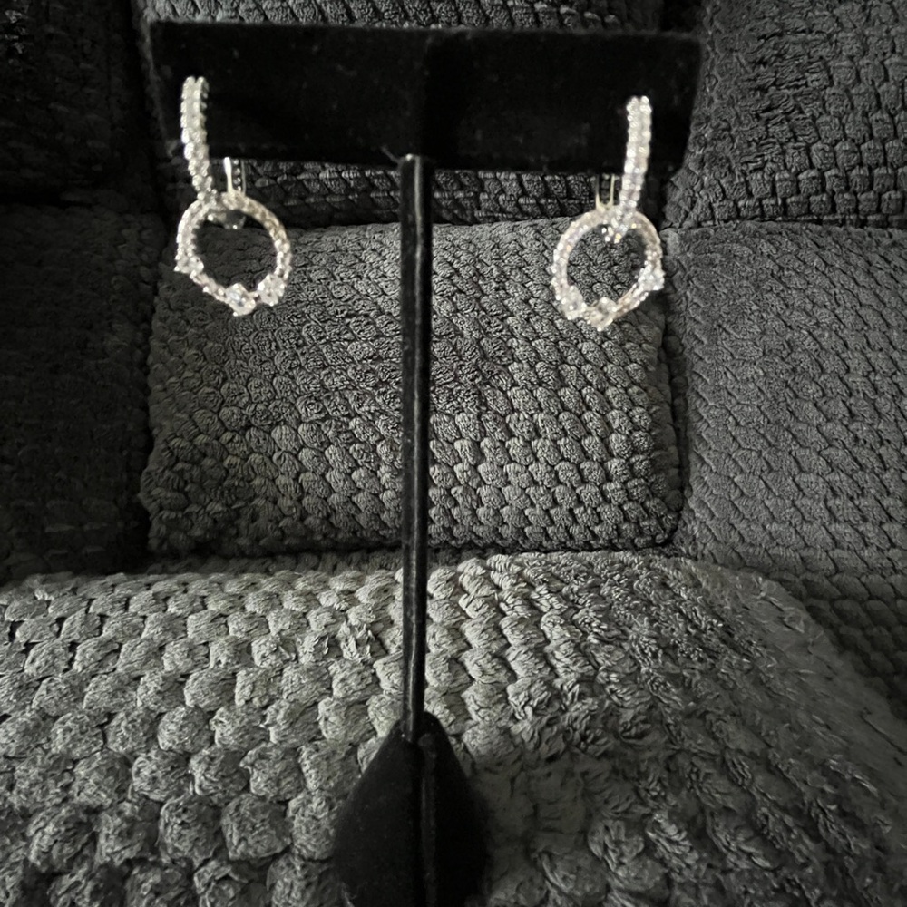 Elegant Silver Hoop Earrings - Picture 2 of 3